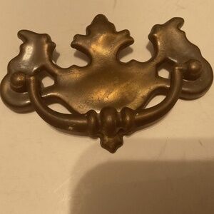 Vintage metal batwing like drawer handle,